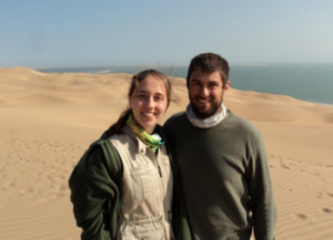 man and woman on sand